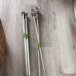 Brushed Silver Curtain rods ($5/ each)