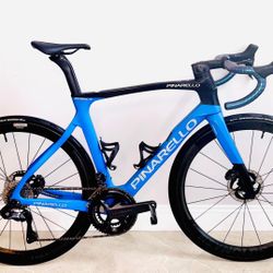 2023 Medium 54cm Pinarello Prince road bike, equipped with Shimano Ultegra Di2 electronic shifting for smooth, precise gear changes. This performance 