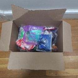 Box Of Random Old Sealed Mcdonald Toys. 