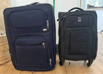 Two Used Soft-Side Rolling Suitcases Set