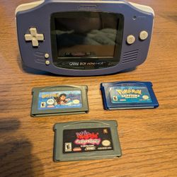 Gameboy Advance With Pokemon Sapphire, Banjo Kazooie Grungy's Revenge, Harry Potter Sorcerers Stone
