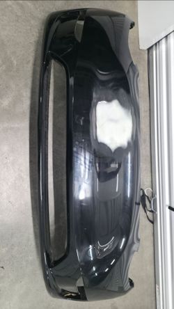 2022 - 2024 TESLA MODEL Y FRONT BUMPER OEM (NO SENSORS)