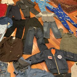 40 pieces boys clothing size 6 with brand new Burberry pants and lots of jackets