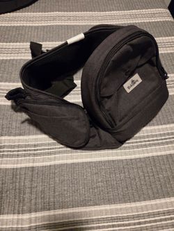 Hip seat baby carrier