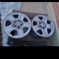 (4) Factory Toyota Rav4 Rims and (3) 215 50 17 Tires.