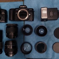 Two Cameras , Lenses And Flash