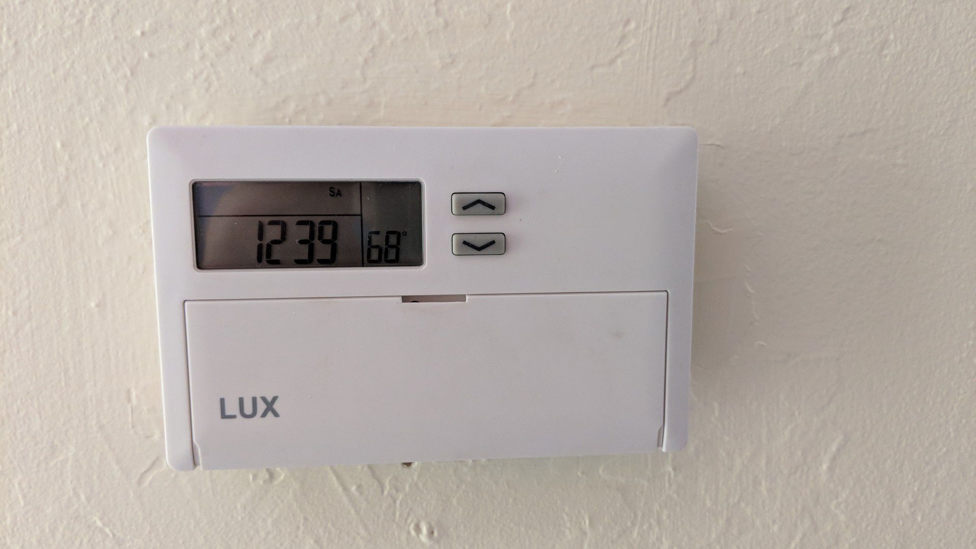 7 day programmable thermostat with filter reminder Lux TX500E
