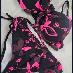 New Floral and Black Bikini Top/Bottoms with lace-up Briefs.  Size Medium.