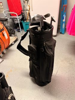 Black Golf Bag with Golf Clubs Set
