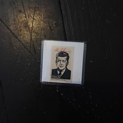 John F Kennedy Old Stamp