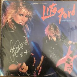 Lita Ford Autographed Album