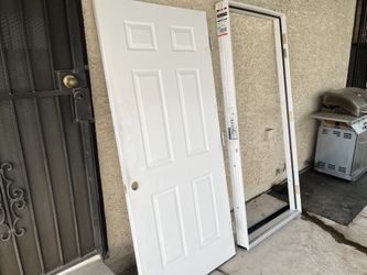 Door with hinges and frame