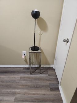 lovely nightstand with its lamp Used Conditions
