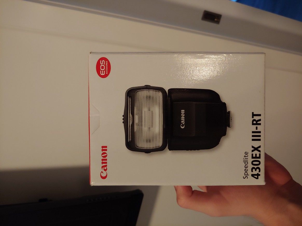 New in box Canon flash