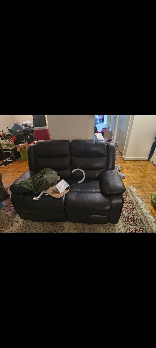 All Black Leather Two-seater Recliner OBO