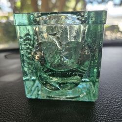 vintage votive candle holder made of heavy green recycled glass