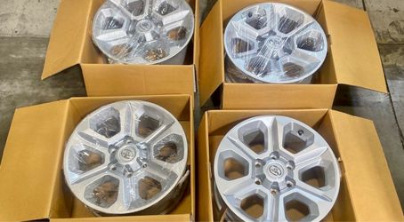 full set of four genuine Toyota 18-inch alloy wheels.