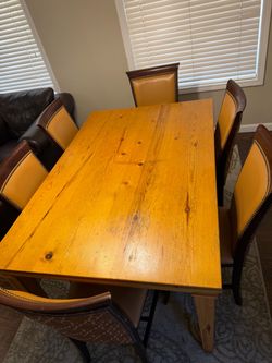 Wooden dining table & chairs