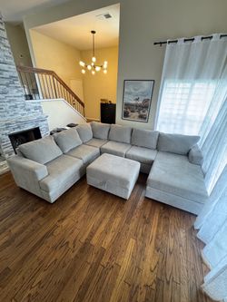 Living Spaces Sleeper Sectional Sofa with Ottoman