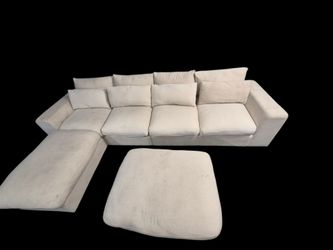 Free white sectional.
