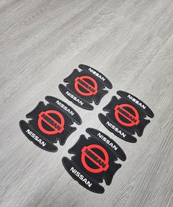 BRAND NEW UNIVERSAL 4PCS NISSAN RUBBER ANTI-SCRATCH DOOR HANDLE BOWL PROTECTOR