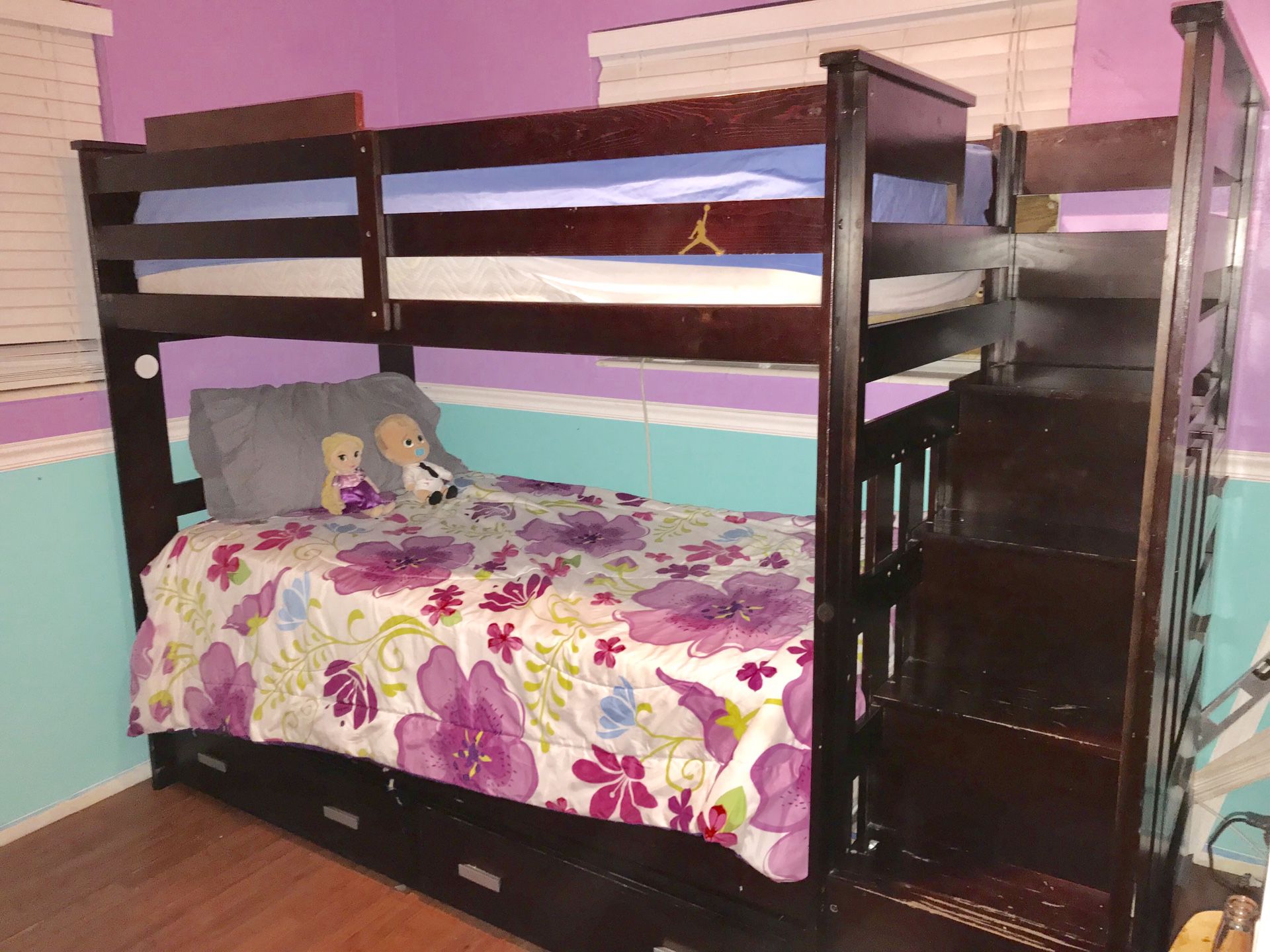 Twin size bunk bed, dark wood with bottom and side drawers