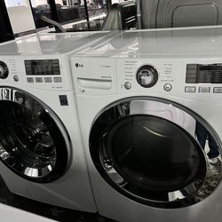 LG 4.5 Cu. Ft. Front Load Washer and 7.4 Cu. Ft. Electric Dryer with TurboWash 360 Laundry Pair in White.