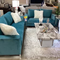 Beautiful Furniture Sofa And loveseat with a free carpet and coffee table on sale now for $1399