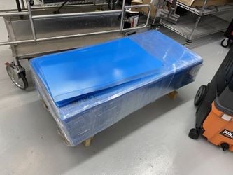lot of 500 sheets of clear PETG .030” x 24” x 48” blue poly lined sheet