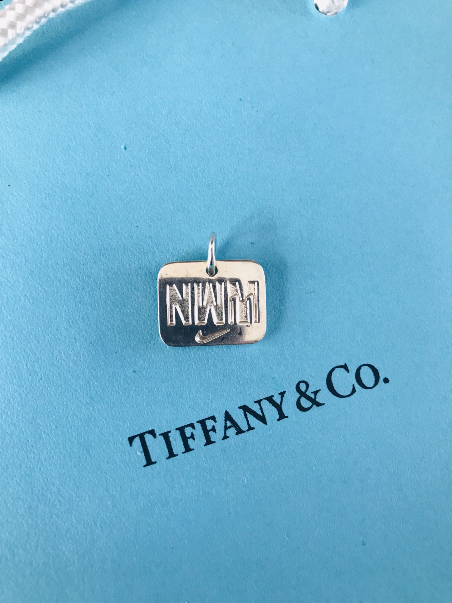 Tiffany & Co. Pre-owned Nike pendant stamped authentic please ask questions thank you for looking Make me an offer