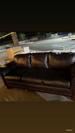 A Rich Dark Brown Leather Sofa