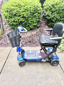  ZooMe Auto-Flex Folding Travel Scooter, FLEX-AUTO. Great condition, works fine, no problems. Automatic fold and unfold with remote.   The Drive ZooMe