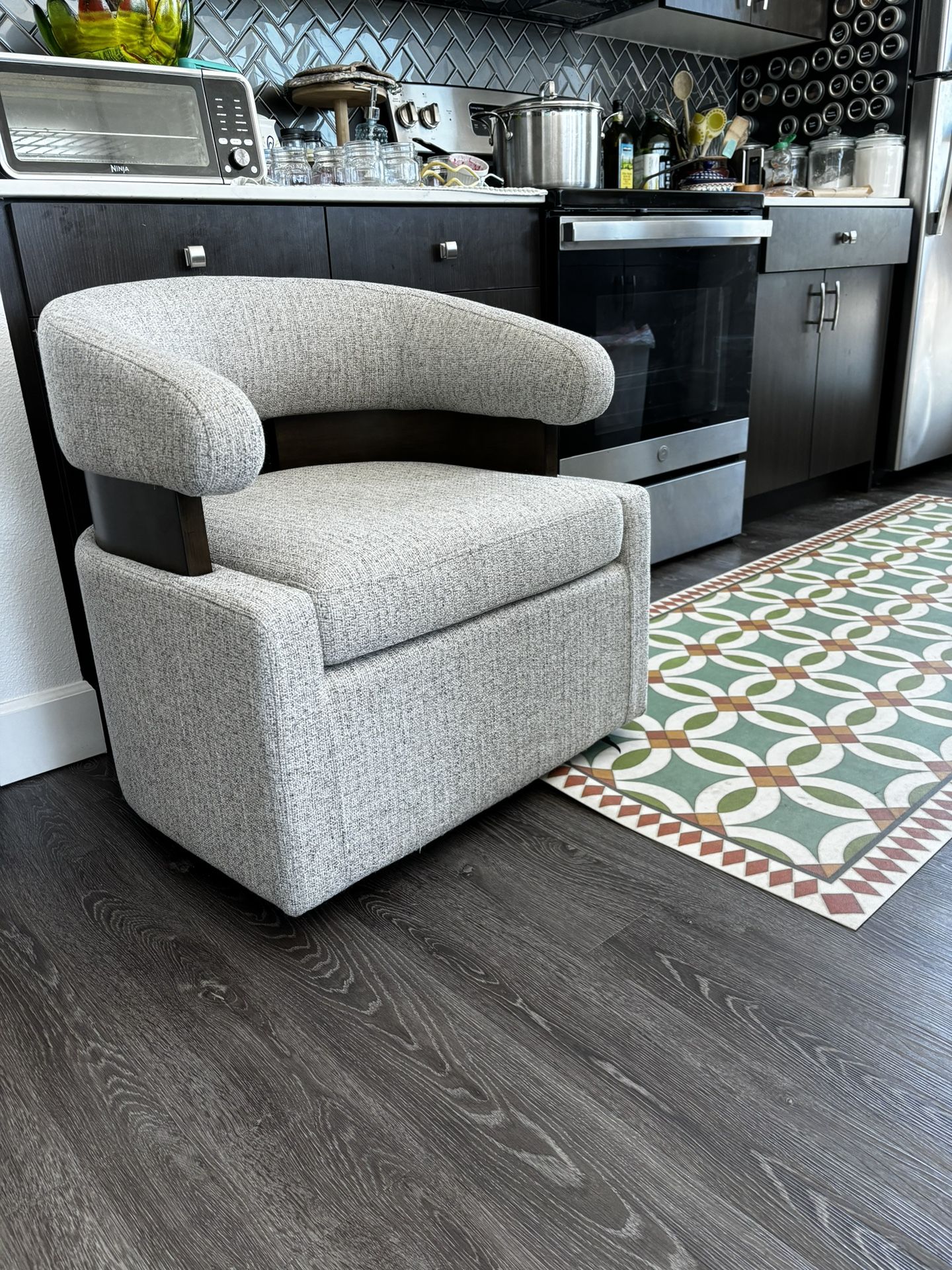 2 Swivel Accent Chairs