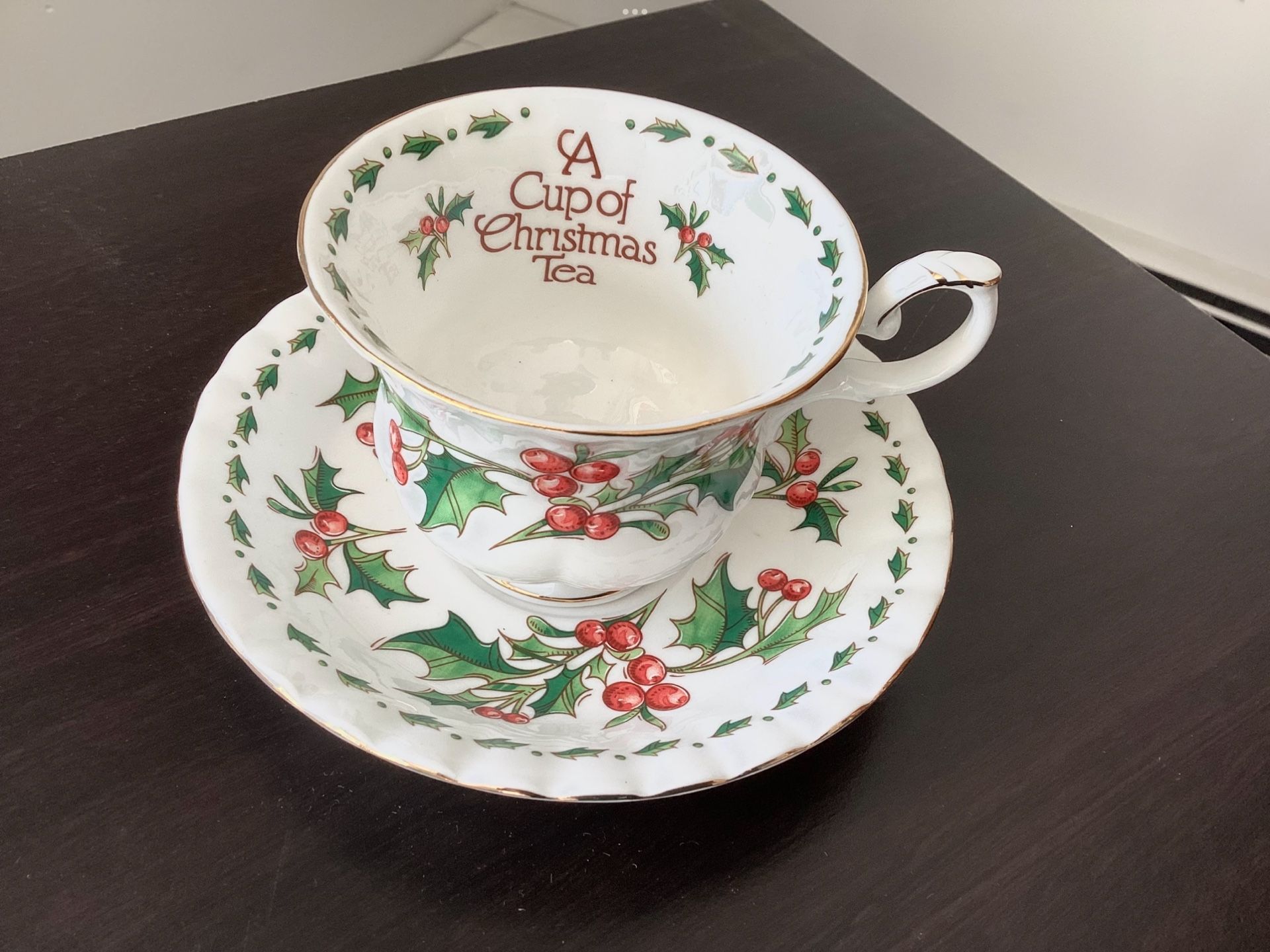 “A Cup Of Christmas Tea” (based on the book) ) Saucer + Cup 1992 Bone China Holly Graphics