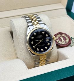 1990s Rolex Datejust 1601 36mm yellow gold stainless steel two tone jubilee bracelet natural diamond black dial yellow gold fluted bezel watch box tag