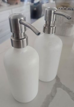 Liquid soap dispensers