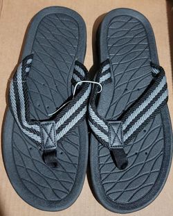 Men's Flip-flops $5 Each 
(Two Available In Size Small 8-9 and Two Available In Size Large 12-13)