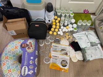 Medela double electric breast pump with attachments
