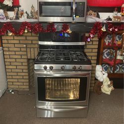KENMORE ,Elite, Gas Stove. Like New, . Frigidaire  Gallery, Microwave, New.