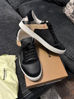 Burberry black leather sneakers.