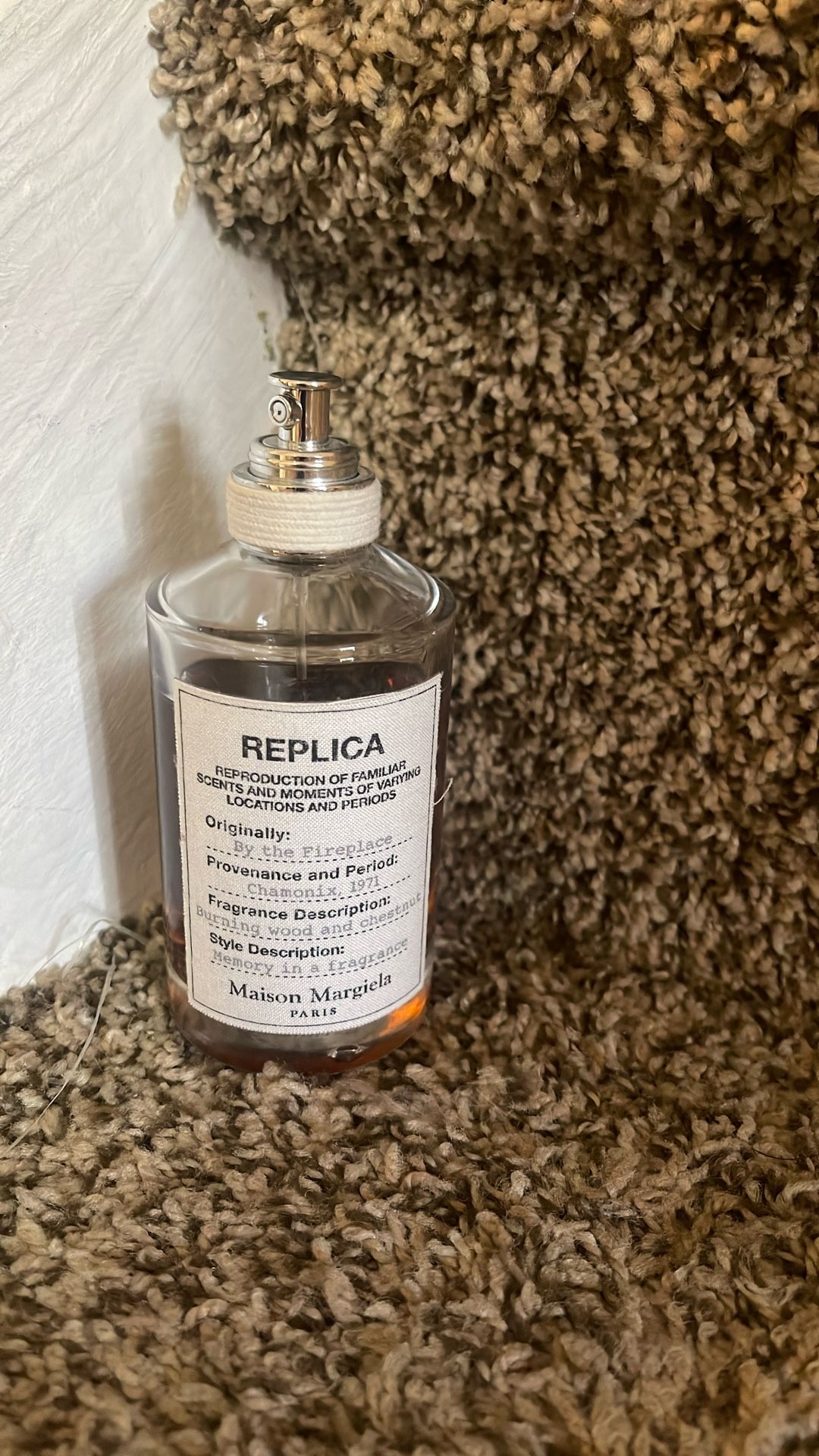 Perfume Replica By The Fireplace