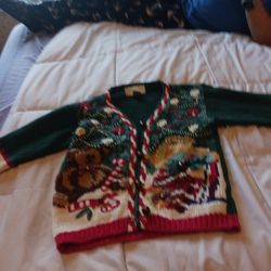 A Child's Bearded Christmas Sweater With Bells