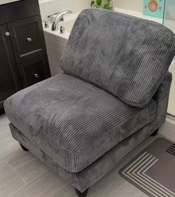 Gray corduroy armless accent chair