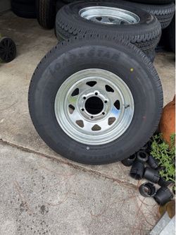 New 225-75-15inch trailer tires with 6-lug galvanized rims. In stock