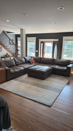 Sectional leather couch + ottoman