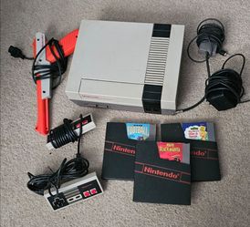 Original Nintendo NES console bundle with games hookups controllers!