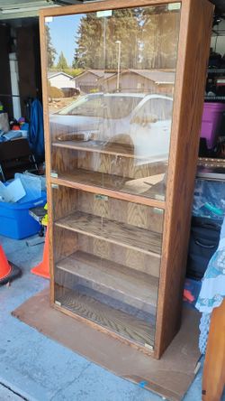 Oak curio cabinet or book shelf