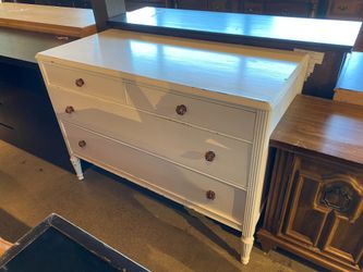 White Three Drawer Dresser with Decorative Knobs