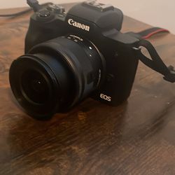 Canon EOS M50 Mark II Mirrorless Camera + 15-45mm Camera lens with two batteries and backpack