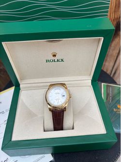 Men’s watch with brown leather strap